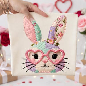 May include: A set of three ceramic mugs with a speckled, matte finish. The mugs are in shades of cream, light gray, and dark gray. Each mug has a simple, minimalist design, perfect for coffee or tea.