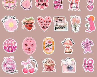 May include: A collection of cute, printable stickers in various shapes, featuring motivational phrases and illustrations. Designs include a fig, a cheetah, a camera, and a cupcake. The stickers are in shades of pink, white, and black.