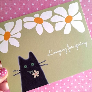 Carte Longing for spring  , carte postale impatient d'être au printemps  , carte chat mignon au milieu des fleurs .
