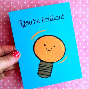 Carte "You're brilliant" , carte de félicitations pour quelqu'un qui vient de réussir son examen, de recevoir son diplôme .
