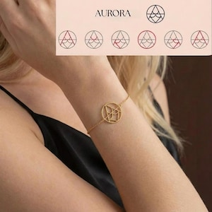 Può includere: Un bracciale a catena color oro con un ciondolo circolare caratterizzato da un intricato design geometrico traforato. Sopra il bracciale, una grafica mostra la parola AURORA e una serie di sei icone circolari con vari motivi a linee in nero e rosso.