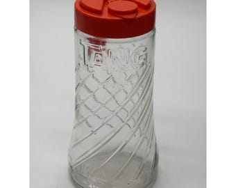 Jarra de vidro vintage Tang, laranja, com tampa articulada, design em espiral e logotipo em relevo. Estilo retrô.