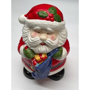 Keramisk jultomtekakburk godishållare festlig juldekoration 1995