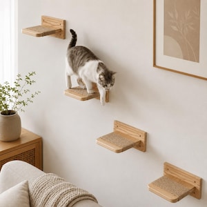 May include: A gray and white cat walks down a series of wooden cat shelves mounted on a white wall. Each shelf has a rectangular sisal scratching surface. The shelves are spaced apart, creating a climbing structure for the cat.