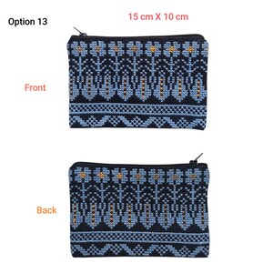 May include: Option 13. Two small, rectangular zippered pouches. The front and back of each pouch feature a detailed, embroidered pattern in black, light blue, and gold. Each pouch measures 15 cm x 10 cm (5.9 in x 3.9 in).