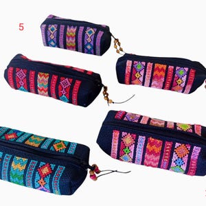Estuche de maquillaje, Tatreez, patrimonio cultural, identidad regional, artesanía cosida a mano, mujeres artesanas, bordado palestino, estuche de maquillaje