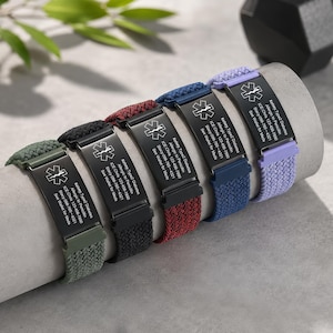 May include: Five medical alert bracelets with braided nylon bands in olive green, black, maroon, navy blue, and lavender. Each features a black metal plate engraved with a white Star of Life symbol and text: Kelsey, Type 2 Diabetes, Allergic to Penicillin, ICE: Chris 123-456-7890, Stacy 098-765-4321, See Wallet for Meds.