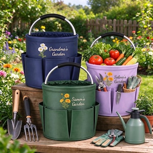 May include: Three cylindrical garden tool bags in navy blue, dark green, and light purple, each with a silver handle and exterior pockets. The bags feature floral illustrations and the text Grandma's Garden, Samm's Garden, and Selina's Garden.