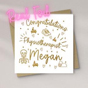 May include: A white greeting card with gold foil text and illustrations, including the words "Congratulations Physiotherapist Megan." The card features images of a skeleton, shoes, and a person receiving a massage. A pink "Real Foil" sign is on top.