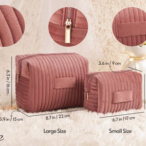 May include: Two dusty rose-colored, corduroy cosmetic bags, one large and one small, with gold zippers. The large bag is 8.7 in / 22 cm wide, and the small bag is 6.7 in / 17 cm wide. The image includes the word "Size".