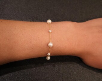 Pulsera de cadena de perlas de tamaños variados