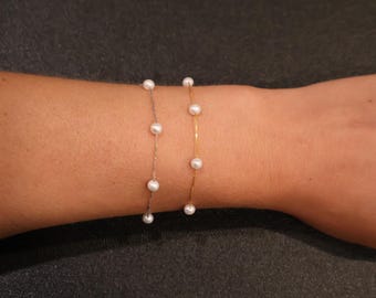 Pulsera de perlas en cadena