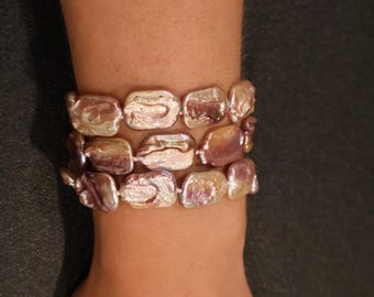Pulsera de perlas rosas de múltiples hilos