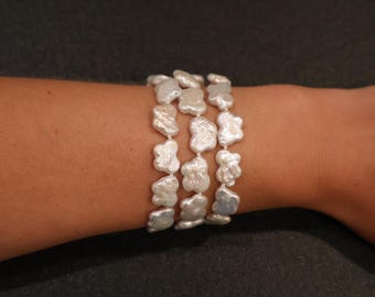 Pulsera de perlas con mariposa