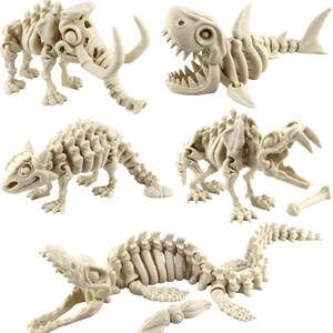 May include: A collection of off-white plastic toy skeletons of prehistoric creatures. The set includes a woolly mammoth, a shark, a dinosaur, a pterodactyl, and a plesiosaur. Each skeleton is articulated and detailed.