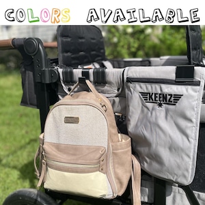 Gancho para cochecito Keenz: colgador de pañales y bolsas de compras