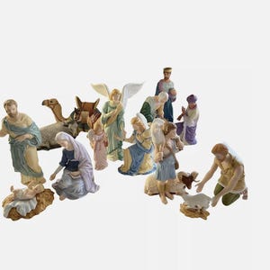 May include: A porcelain nativity scene with 12 figures, including Mary, Joseph, baby Jesus, angels, shepherds, and animals. The figures are painted in various colors, including blue, green, red, and yellow.