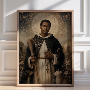 May include: A framed portrait of a man in religious attire, holding a broom and rosary, with a dog and cat at his feet. The artwork features a halo and floral background, presented in a wooden frame. The color palette is muted with warm tones.