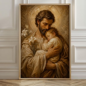 May include: A framed print depicting a tender scene of a man cradling a sleeping child. The artwork features warm, sepia tones, with the man's face and the child's hair highlighted. White lilies are held in the man's hand, adding a touch of purity.