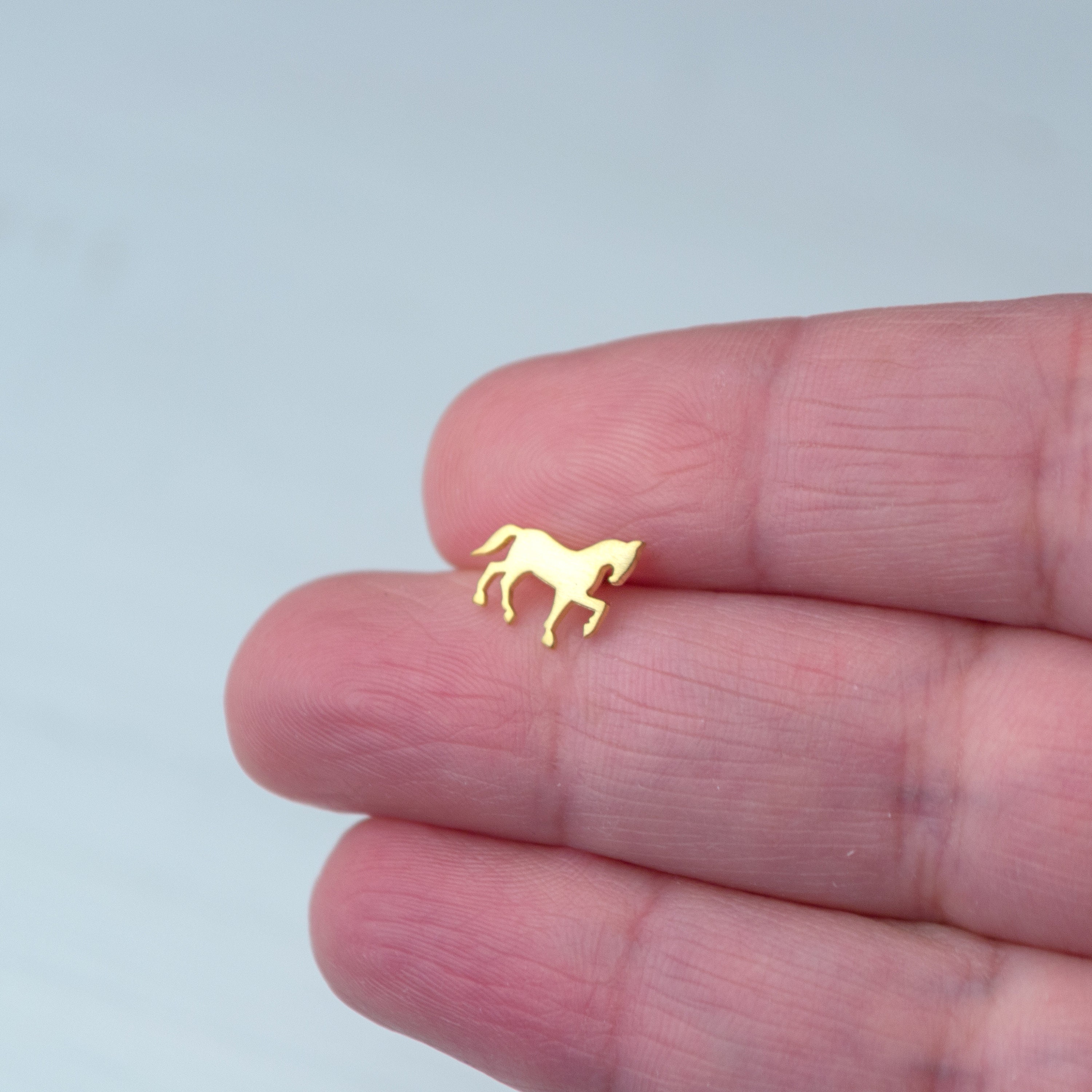 Gold horse best sale earrings