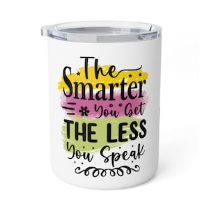 May include: White insulated tumbler with a clear lid. The tumbler features the text "The Smarter You Get The Less You Speak" in black script and block letters, with colorful brushstroke accents in yellow, pink, and green.