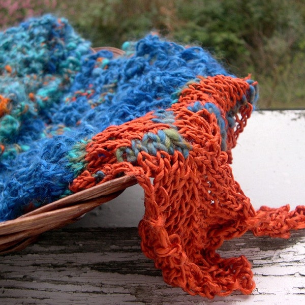 Handknitted unique art scarf in handspun yarn: 'Orange flames dancing on water'
