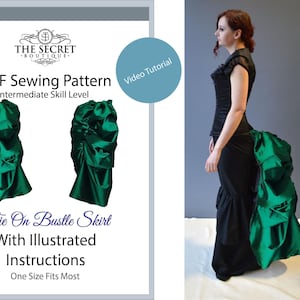 May include: A PDF sewing pattern for a tie-on bustle skirt from The Secret Boutique. The pattern includes illustrated instructions for an intermediate skill level. The image displays a green bustle skirt worn over a black skirt and top.