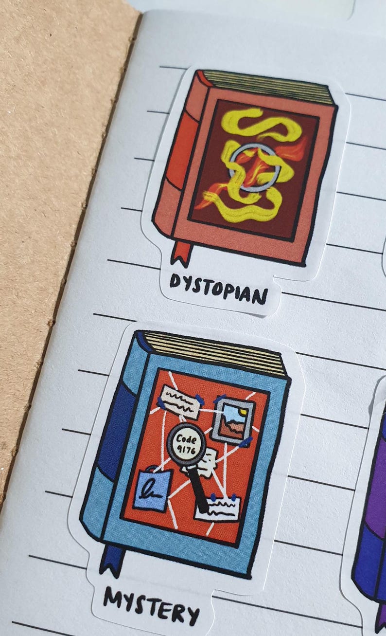 Dystopian and Mystery Book stickers on a lined notebook page.