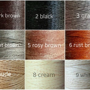 May include: Nine spools of waxed thread in various colors, including dark brown, black, gray, light brown, rosy brown, rust brown, nude, cream, and white. The spools are labeled with numbers 1 through 9.