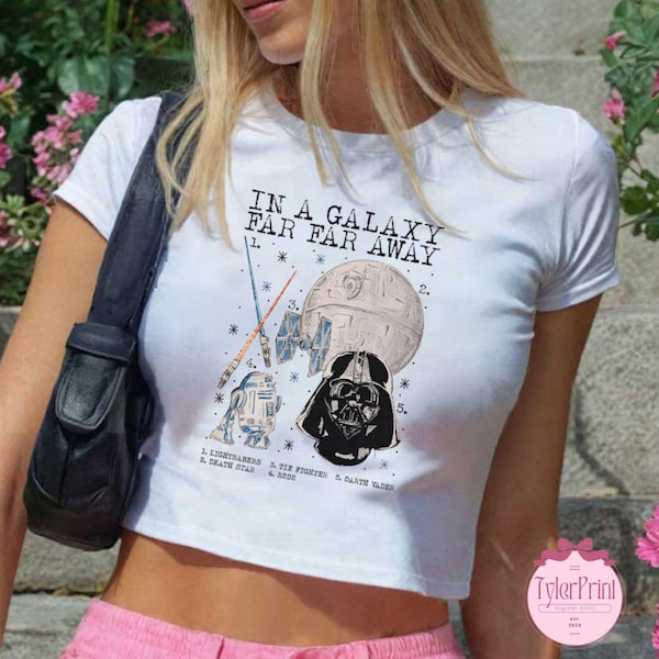 In a galaxy far far away Disney Star Wars Baby Tee Crop Top, Galaxy's Edge Star Wars shirt, May The Force be With You Girls Trip Tshirt
