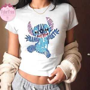 May include: A white t-shirt with a blue Stitch character made of words. The words say "Ohana means family and family means no one gets left behind or forgotten".