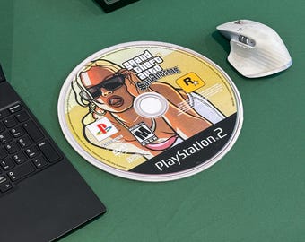 Alfombrilla de ratón redonda inspirada en un juego de CD de PlayStation 2.