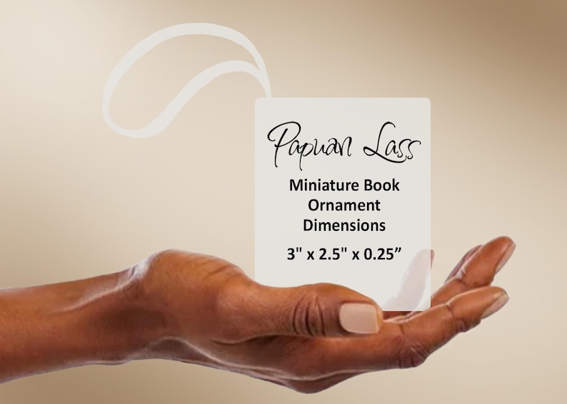 May include: A rectangular white ornament featuring the text Papuan Lass Miniature Book Ornament Dimensions 3 inches by 2.5 inches by 0.25 inches with a white loop at the top for hanging purposes, presented on a neutral background.