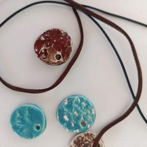 handmade ceramic necklace  pendant four pieces