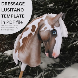 May include: A plush horse head on a wooden stick, designed as a dressage Lusitano template. The horse head features a brown and white pattern, blue eyes, and a white mane. Text on the image reads "DRESSAGE LUSITANO TEMPLATE in PDF file".