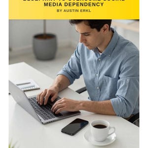 May include: A person using a laptop at a white desk. The image includes a coffee cup, a smartphone, and a notepad. The text on the yellow banner reads "DIGITAL DETOX: THE COMPLETE BLUEPRINT TO OVERCOME SOCIAL MEDIA DEPENDENCY" by Austin Erkl.