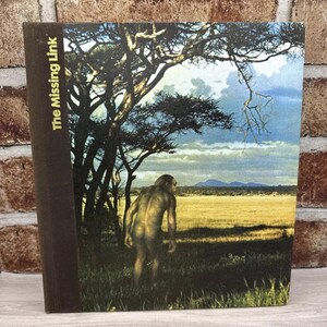 May include: A handmade, wooden cutting board with a natural finish. The rectangular board features a juice groove and a handle. Dimensions are approximately 18 inches long, 12 inches wide, and 1 inch thick.