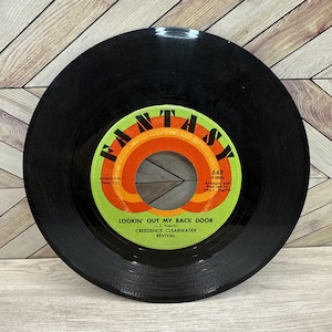 Vintage Creedence Clearwater Revival 45 RPM Vinyl: 1970s Rock Classic
