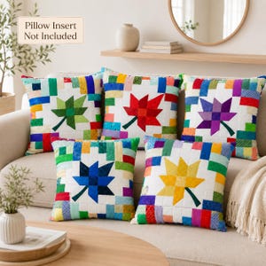 May include: Five square throw pillows featuring a patchwork design of colorful fabric squares surrounding a central leaf motif. Each pillow displays a different leaf color: green, red, purple, blue, and yellow. Text reads: Pillow Insert Not Included.