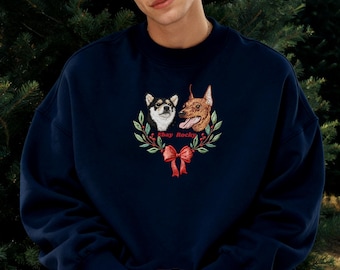 May include: Navy blue sweatshirt with an embroidered design featuring two dogs within a wreath, a red bow, and the text "Ebay Rocky". The sweatshirt has a crew neck and long sleeves. The brand name "PAWPAW PATCHES" is in the top left corner.