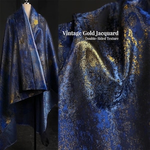 May include: A draped textile with a vintage gold and blue jacquard pattern. The fabric is double-sided and has a textured appearance. The text "Vintage Gold Jacquard" and "Double-Sided Texture" are visible.