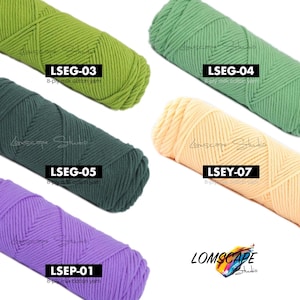 May include: A collection of colorful yarn skeins in shades of green, teal, yellow, and purple. Each skein has a label with a product code and the text "8-ply milk cotton yarn". The "Lomscape Studio" logo is visible in the bottom right corner.