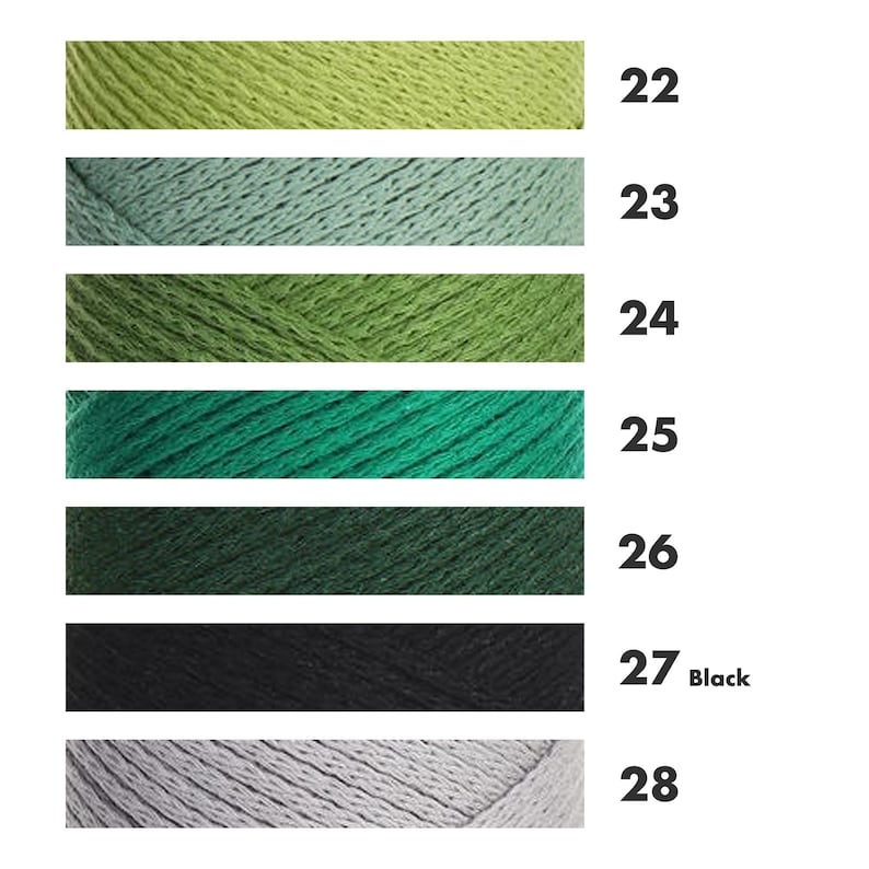 May include: A color chart of yarn skeins in shades of green, black, and gray. The yarn colors are labeled with numbers 22 through 28. The color range includes light green, teal, dark green, and black. The yarn is tightly wound and appears soft.