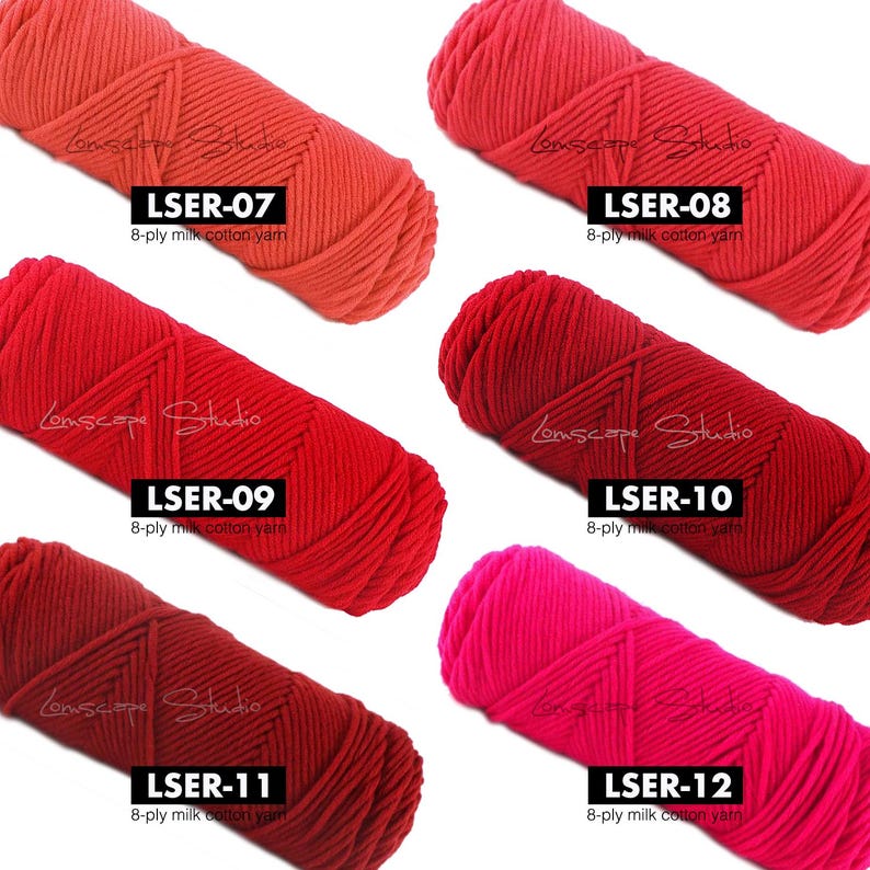 May include: A collection of six skeins of 8-ply milk cotton yarn in various shades of red and pink. Each skein is labeled with a unique code: LSER-07, LSER-08, LSER-09, LSER-10, LSER-11, and LSER-12. The yarn is suitable for knitting and crochet projects.