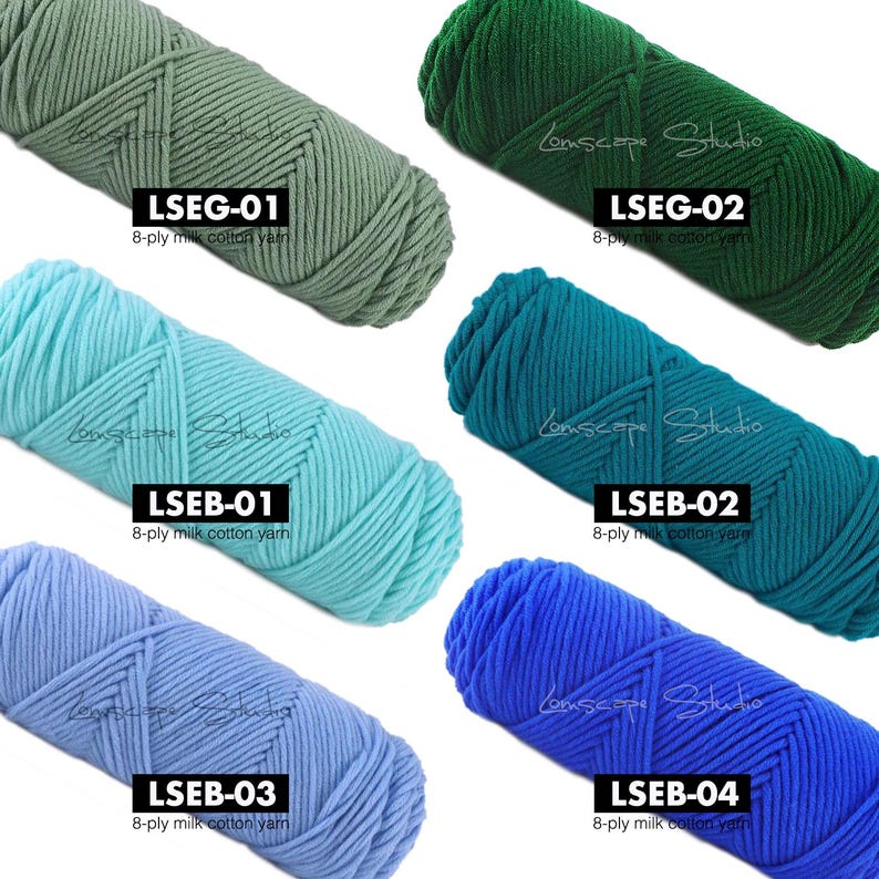 May include: Six skeins of 8-ply milk cotton yarn in various colors. The colors include shades of green, teal, blue, and a lighter blue. Each skein has a label with a color code. The yarn is from Lomscope Studio.