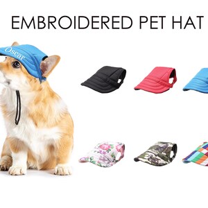 May include: A blue, red, black, camouflage, and floral patterned pet hat with a white embroidered name "Oscar" on the blue hat. The hats are designed for dogs and are shown on a white background.