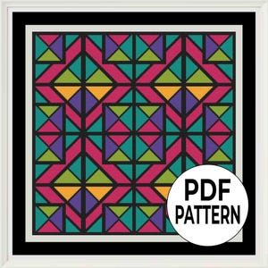 May include: A framed cross-stitch pattern featuring a geometric design with pink, teal, purple, green, and yellow shapes on a black background. The pattern is labeled "PDF PATTERN" in a white circle.