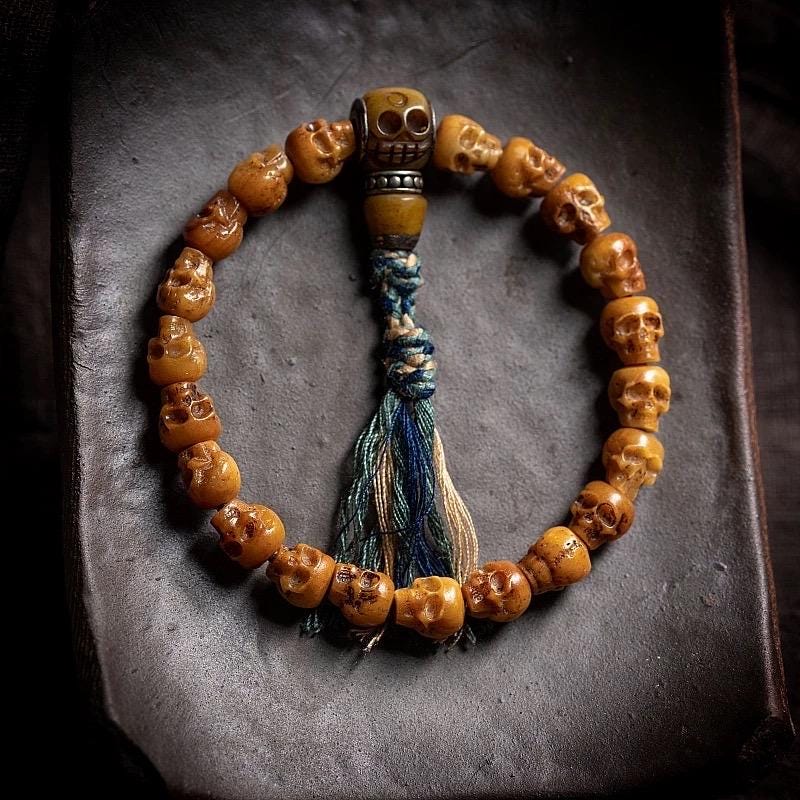 Handcrafted Yak Bone Skull Mala Bracelet: Tibetan Prayer Beads
