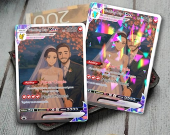 May include: Two trading cards featuring a wedding theme. The cards display a couple in wedding attire, with the text "Wedding Day VMAX" and "Power Couple". The cards have a holographic effect and are set against a wooden surface.