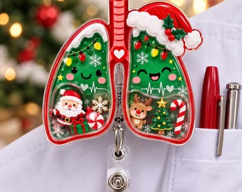 May include: A lung-shaped badge reel featuring a festive Christmas theme with a Santa hat, green glittery surfaces, and smiling faces. Inside the clear compartments are miniature figures of Santa Claus, a reindeer, a Christmas tree, and a candy cane.